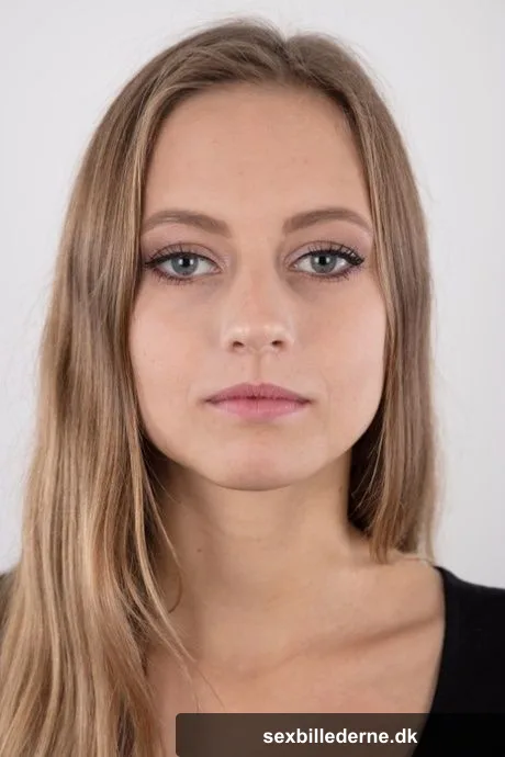 Tall teen Eliska stands totally naked while making her nude modeling debut