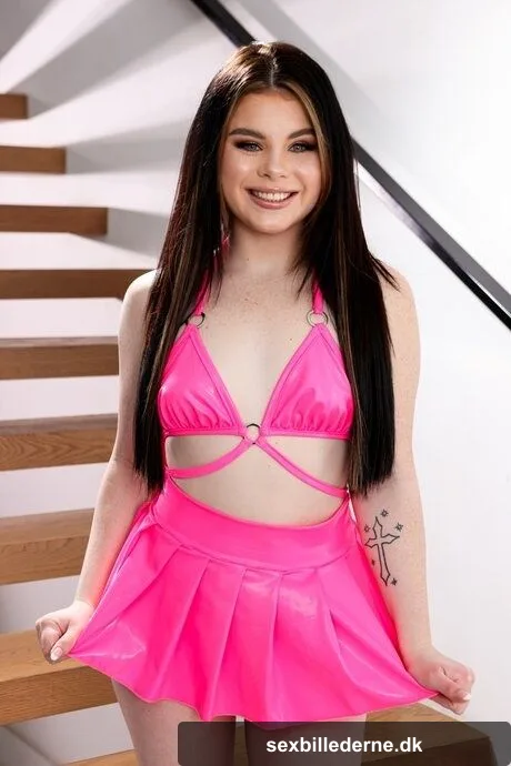 Petite brunette honey Lola Valentine flaunts her round ass and dick anally