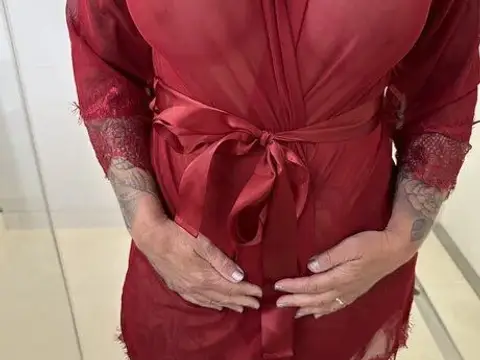 Busty blonde MILF Cory Chase poses solo before sex with a black boy