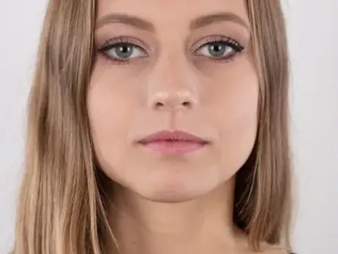Tall teen Eliska stands totally naked while making her nude modeling debut
